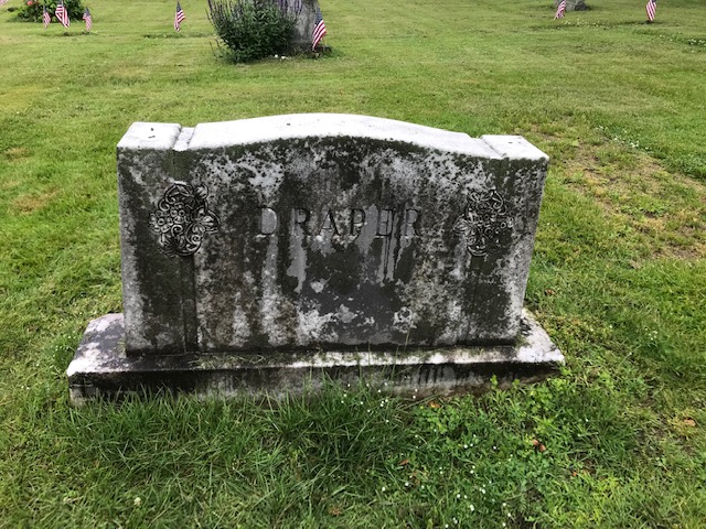 Marble headstone cleaning before waterside cemetery