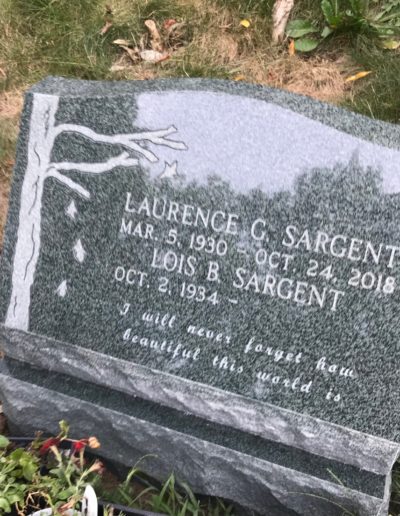 Evergreen Imperial Granite tree design on headstone Greenlawn Cemetery Salem Mass